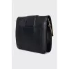 Leather bag with chain and logo
