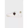 Men's leather sneakers decorated with patches