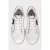 Men's leather sneakers decorated with patches