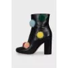 Leather ankle boots with fur trim