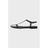 Black leather sandals with thin straps