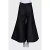 Black flared trousers