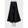 Black flared trousers
