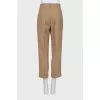 Beige wool trousers with creases