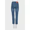 Skinny jeans with a signature logo on the side