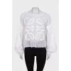 Knitted sweater with a raised logo