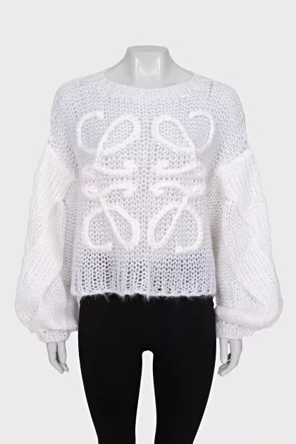 Knitted sweater with a raised logo