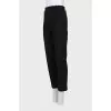 Tapered trousers with zippers at the bottom