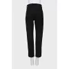 Tapered trousers with zippers at the bottom