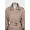 Beige double-breasted trench coat with belt