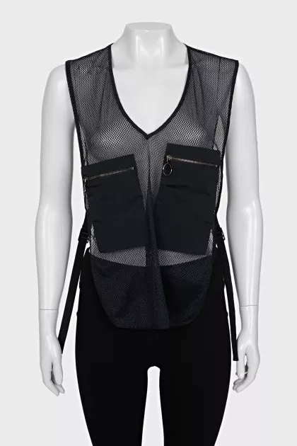 Mesh top with zip patch pockets