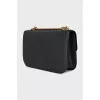 Black bag with gold logo