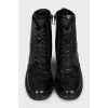 Leather boots with a zipper and perforations
