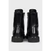 Leather boots with a zipper and perforations