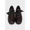 Brown leather lace-up brogues