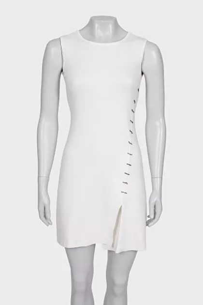 White dress with an asymmetrical side seam