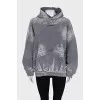 Oversized hoodie with a ripped effect