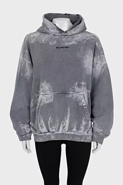 Oversized hoodie with a ripped effect