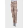 Tapered plaid trousers