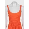Fitted dress with zip and pleats
