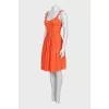 Fitted dress with zip and pleats