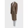 Suit consisting of a jacket with decor and a skirt