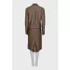 Suit consisting of a jacket with decor and a skirt