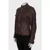 Fitted leather jacket with perforations