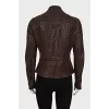 Fitted leather jacket with perforations