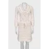 Knitted dress with an openwork pattern