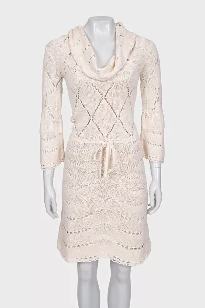 Knitted dress with an openwork pattern