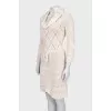 Knitted dress with an openwork pattern