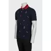 Men's blue polo shirt with branded embroidery