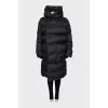 Voluminous down jacket with buttons