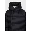 Voluminous down jacket with buttons