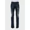 Men's ripped jeans with buttons