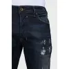 Men's ripped jeans with buttons