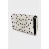 White polka dot wallet