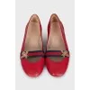 Red ballet flats with textile decor
