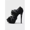 Shoes with a figured cutout and rhinestones