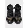 Insulated leather boots decorated with rivets