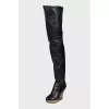 Leather over-the-knee boots with a gold wedge heel
