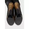 Leather over-the-knee boots with a gold wedge heel