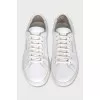 Leather sneakers with a gold logo