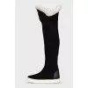 Suede over-the-knee boots with a contrasting sole