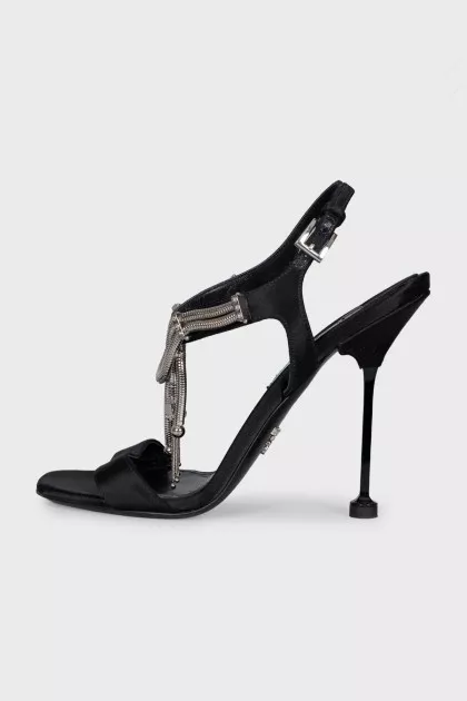 Black sandals with metallic decor