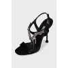 Black sandals with metallic decor
