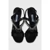 Black sandals with metallic decor