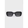 Black sunglasses with the brand logo