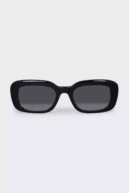 Black sunglasses with the brand logo
